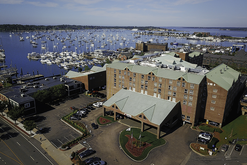 Aerial photo of the Newport Marriott hotel right along the Newport Habor