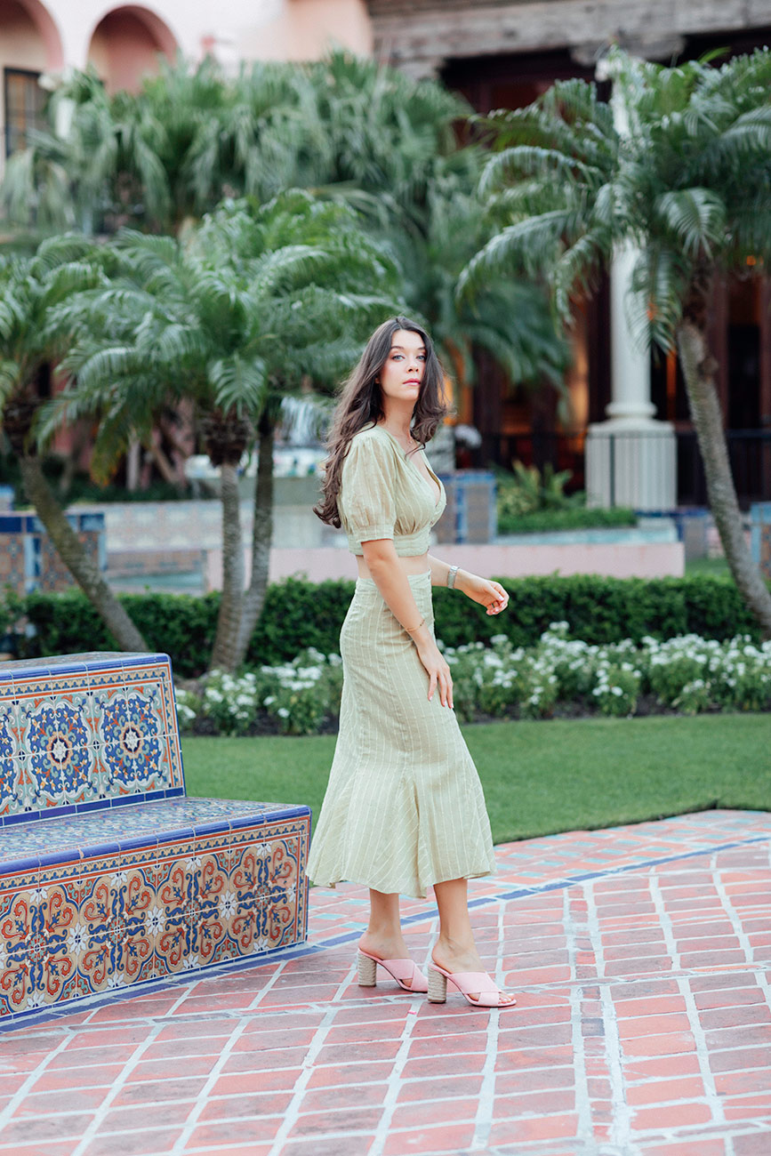 72 hours in Boca Raton, Florida with The Boca Resort Liv For Luxury Liv Micheli is wearing a Free People green two piece set, and Club Monaco sandals at the Boca Resort