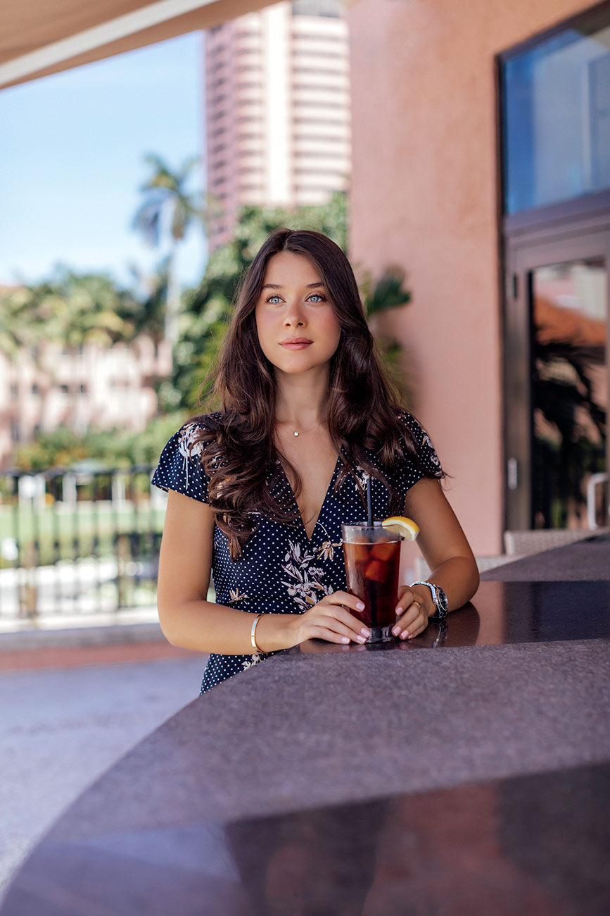 72 hours in Boca Raton, Florida with The Boca Resort Liv For Luxury Liv Micheli is wearing a Lost and Wander Catalina mini dress at 501 East restaurant at the Boca resort in Boca Raton, Florida