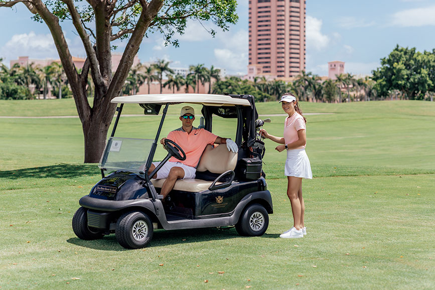 72 hours in boca raton, Florida with the boca resort liv for luxury liv micheli wearing a nike Flex Golf Skirt, a Nike pink Golf Polo, Nike Golf Shoes, a nike golf visor, and playing golf at the Boca Resort golf course at the Boca Resort in Boca Raton, Florida 