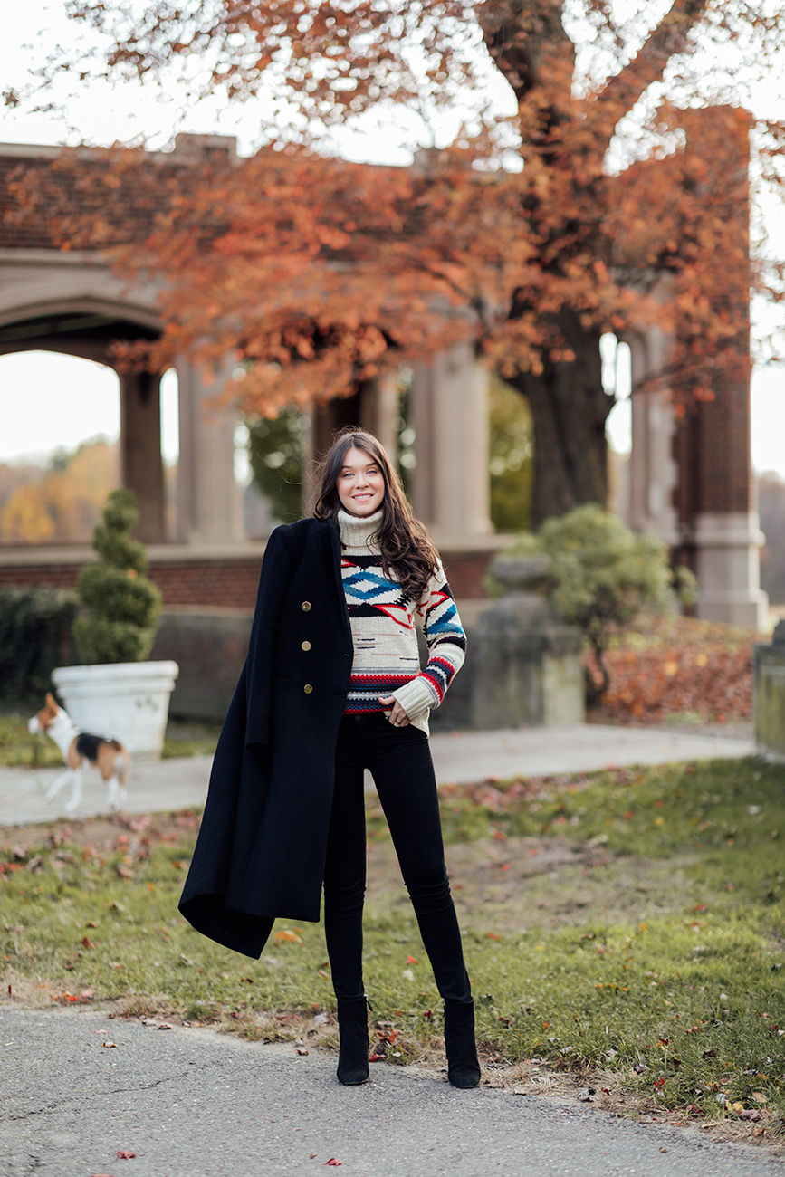 the one coat you need this season liv for luxury liv micheli wearing The Gema Coat from Club Monaco, a Polo Ralph Lauren sweater, Paige denim and IRO boots.