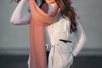 the one must-have accessory for winter liv for luxury liv micheli wearing blanket scarf from Anthropologie