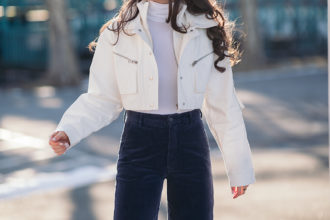 20 cropped jackets to ease you into spring liv for luxury liv micheli wearing polo Ralph Lauren corduroy pants, I.AM.GIA Icepere jacket, Wolford Colorado bodysuit and Stuart Weitzman white boots.